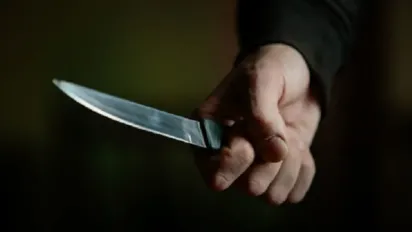 На Полтавщині чоловік зарізав співмешканку кухонним ножем: жінка померла на очах у сина - фото