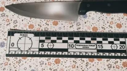 На Київщині чоловік ледь не зарізав співмешканку - фото