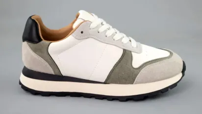 Тепло та сухо: огляд матеріалів для жіночих кросівок на дощову осінь - фото