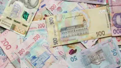 "Зимова 1000 гривень": Чому виплати затримуються та коли чекати грошей на картці - фото