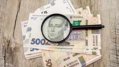 Українцям виплатять по 6500 гривень допомоги: хто отримає кошти автоматично та у яких областях - фото