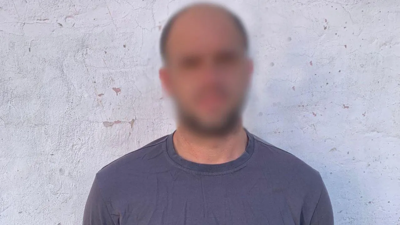 Обкрадав будинки, поки люди були в укритті: у Києві на Подолі затримали квартирного злодія 